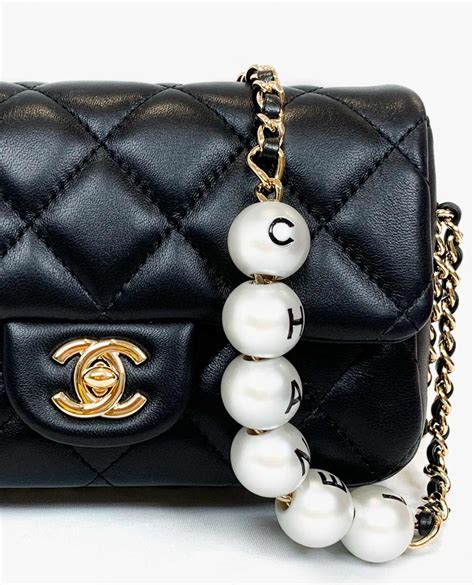 chanel bag with pearl strap|Chanel bag with chain strap.